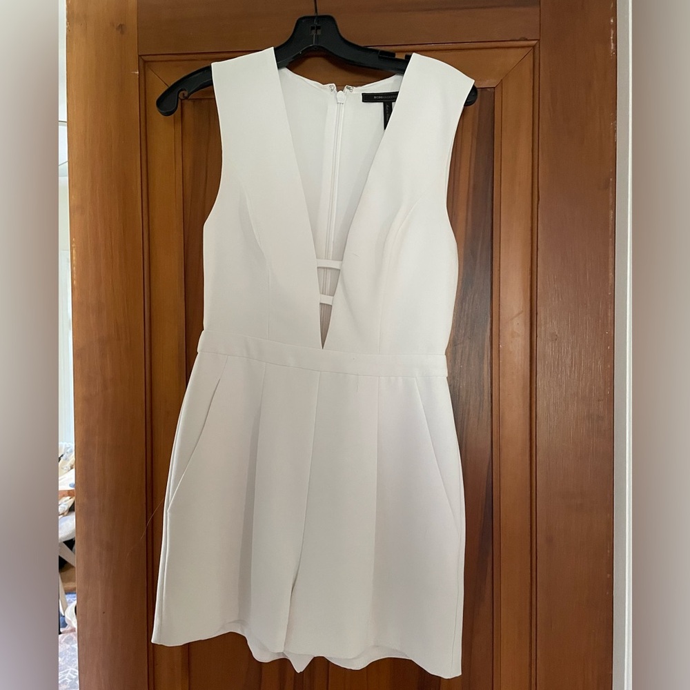 White BCBG Max Azria romper. Worn once, retails $250 new. Super cute!